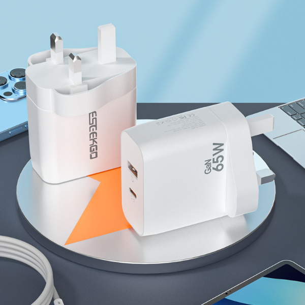 Two white Eseekgo GaN wall chargers, including the 65W, on a desk